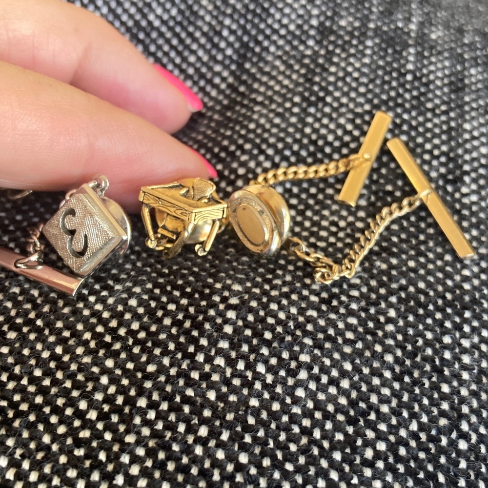 Lot of tie tac pins with Chain SWANK (2) and one unsigned.